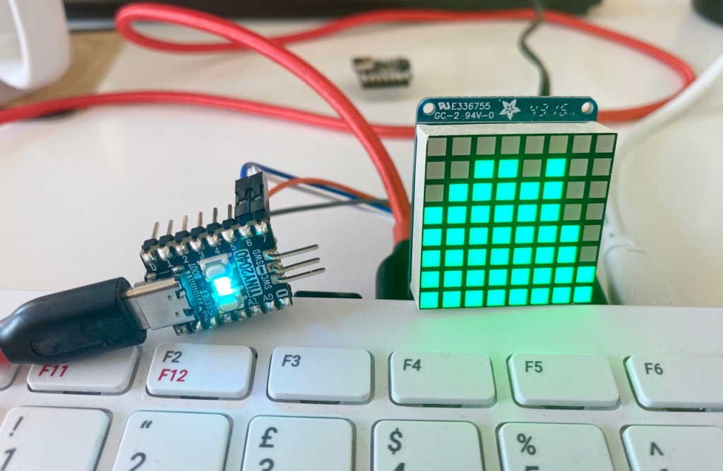 The matrix display client and the CPU activity display example running on a Raspberry Pi 400